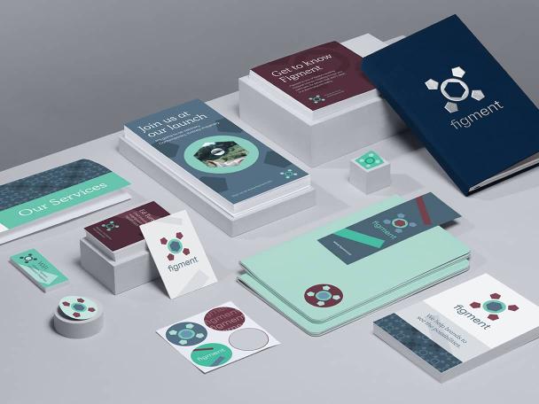 Collection of exclusive custom notebooks, brochures, flyers, stickers, business cards and mini cards created with MOO Business Printing Services